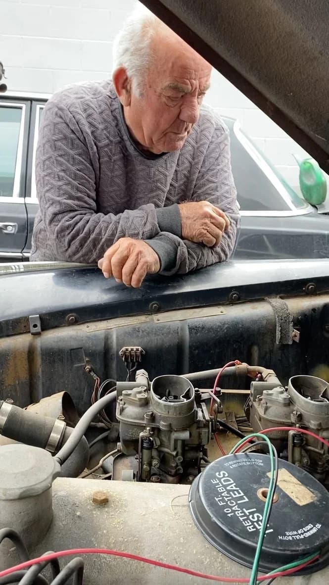 Mike inspecting a classic engine